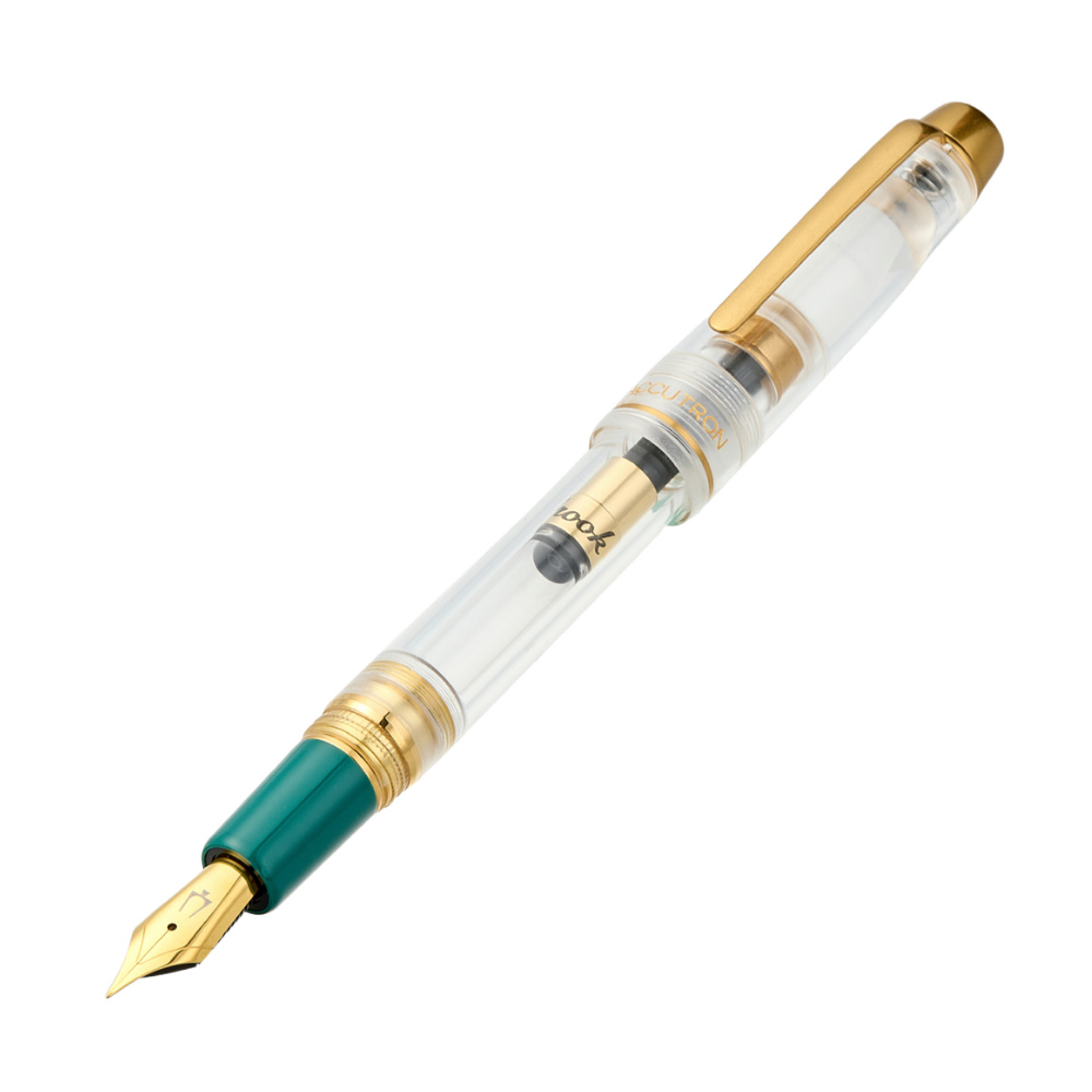Esterbrook × Accutron Spaceview Gold Trim Füllfederhalter aus transparentem Acryl mit grünem Griffstück und vergoldeten Metallteilen