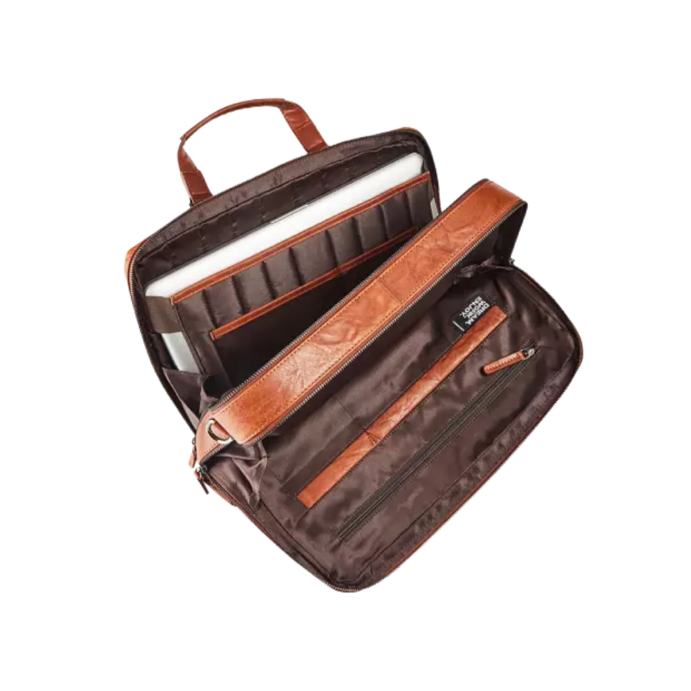 Interior view of cognac leather business bag showing organized compartments.