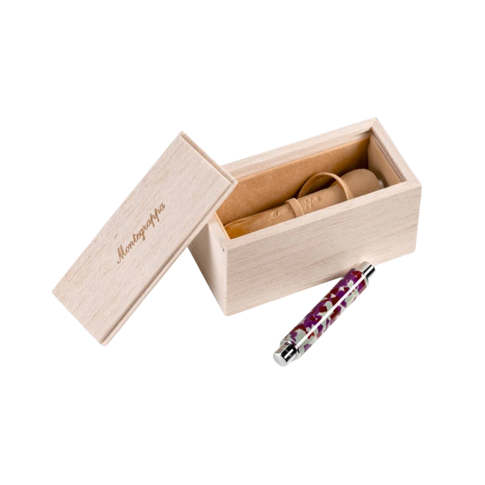 Montegrappa Gnomo Obsession Purple Fountain Pen displayed inside a premium gift box.