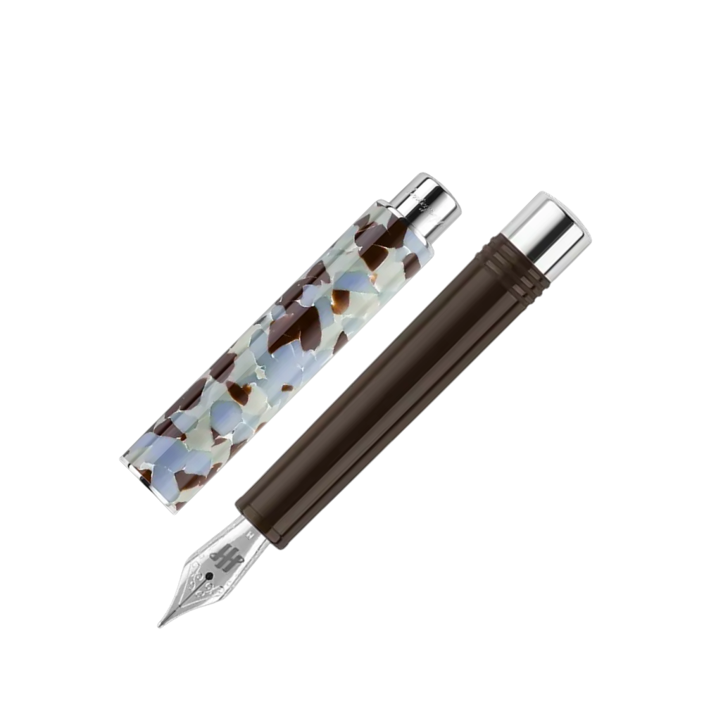 Montegrappa Gnomo Obsession Mocha Steel Fountain Pen, close-up of the nib with detailed trim accents.