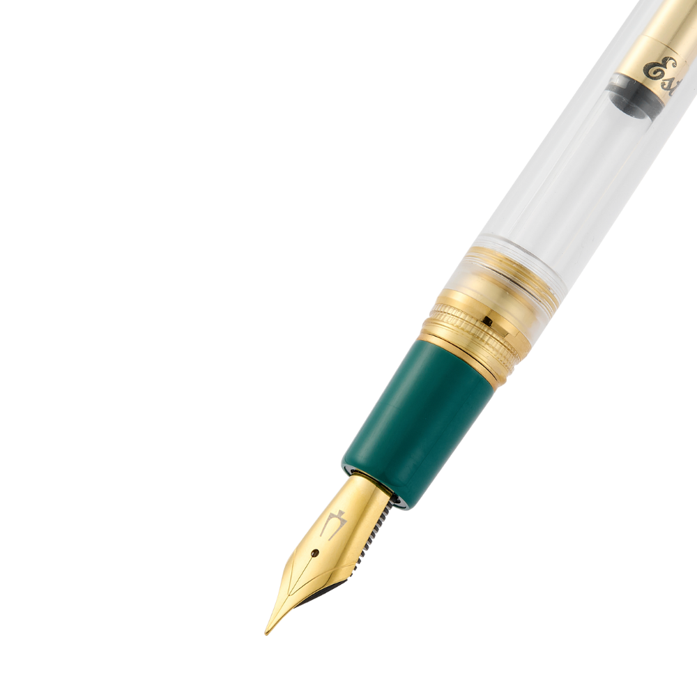 Esterbrook × Accutron Spaceview Gold Trim Füllfederhalter aus transparentem Acryl mit grünem Griffstück und vergoldeten Metallteilen