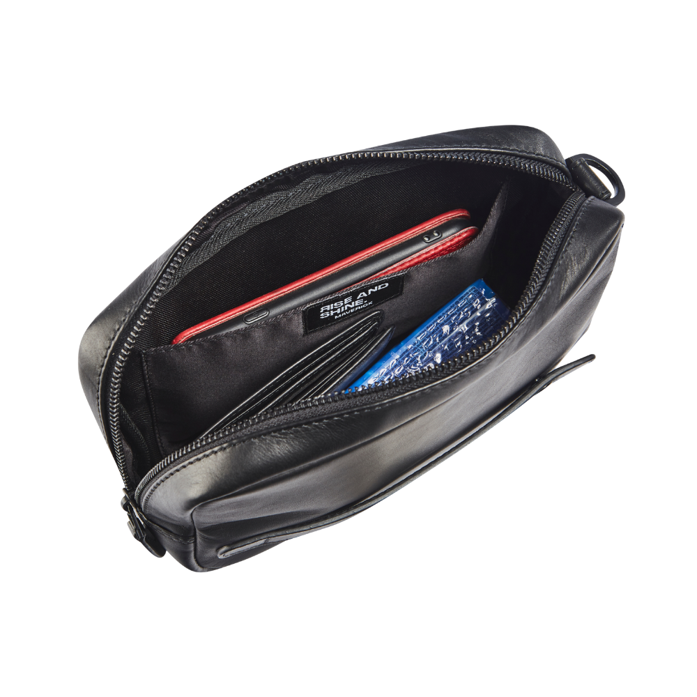 Side view of the black leather men's clutch showing the compact design and smooth finish.