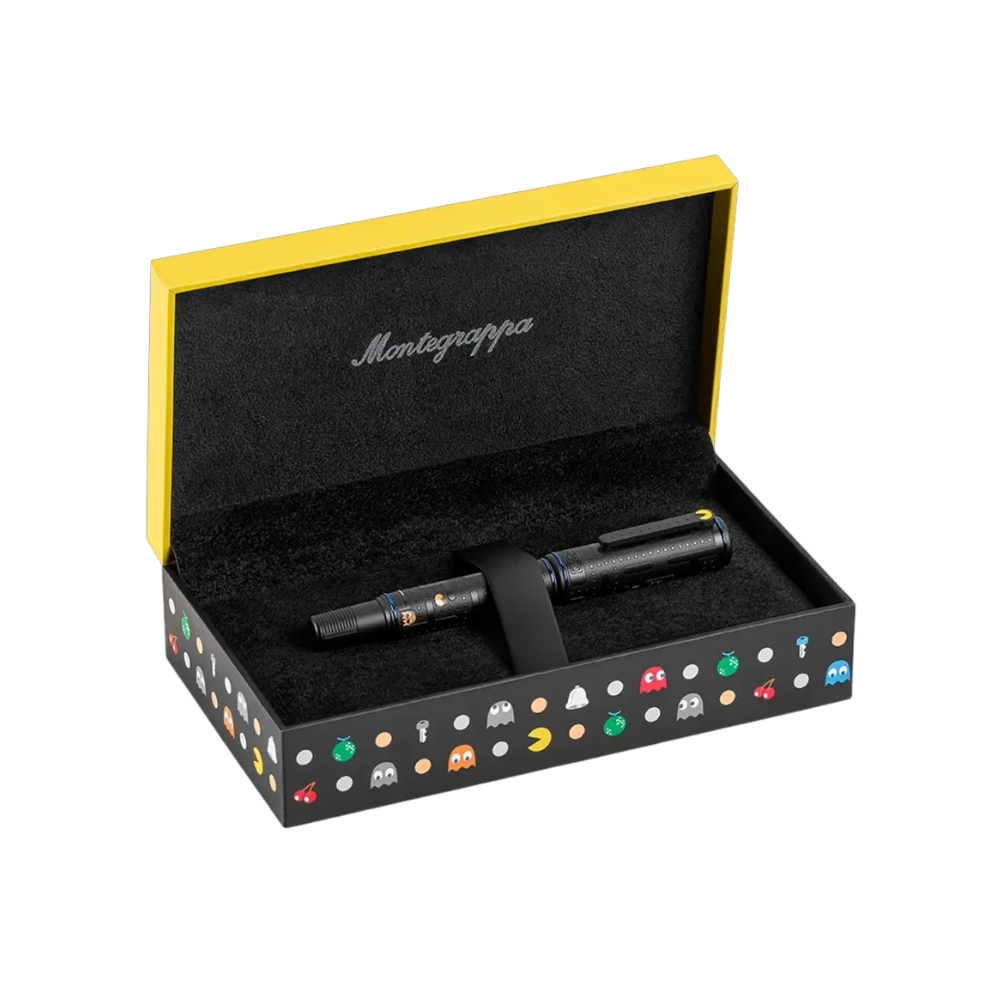 Side view of the Montegrappa PAC-MAN Ghostwriter Rollerball Pen, showcasing the sleek black anodized finish and bright yellow and red details.