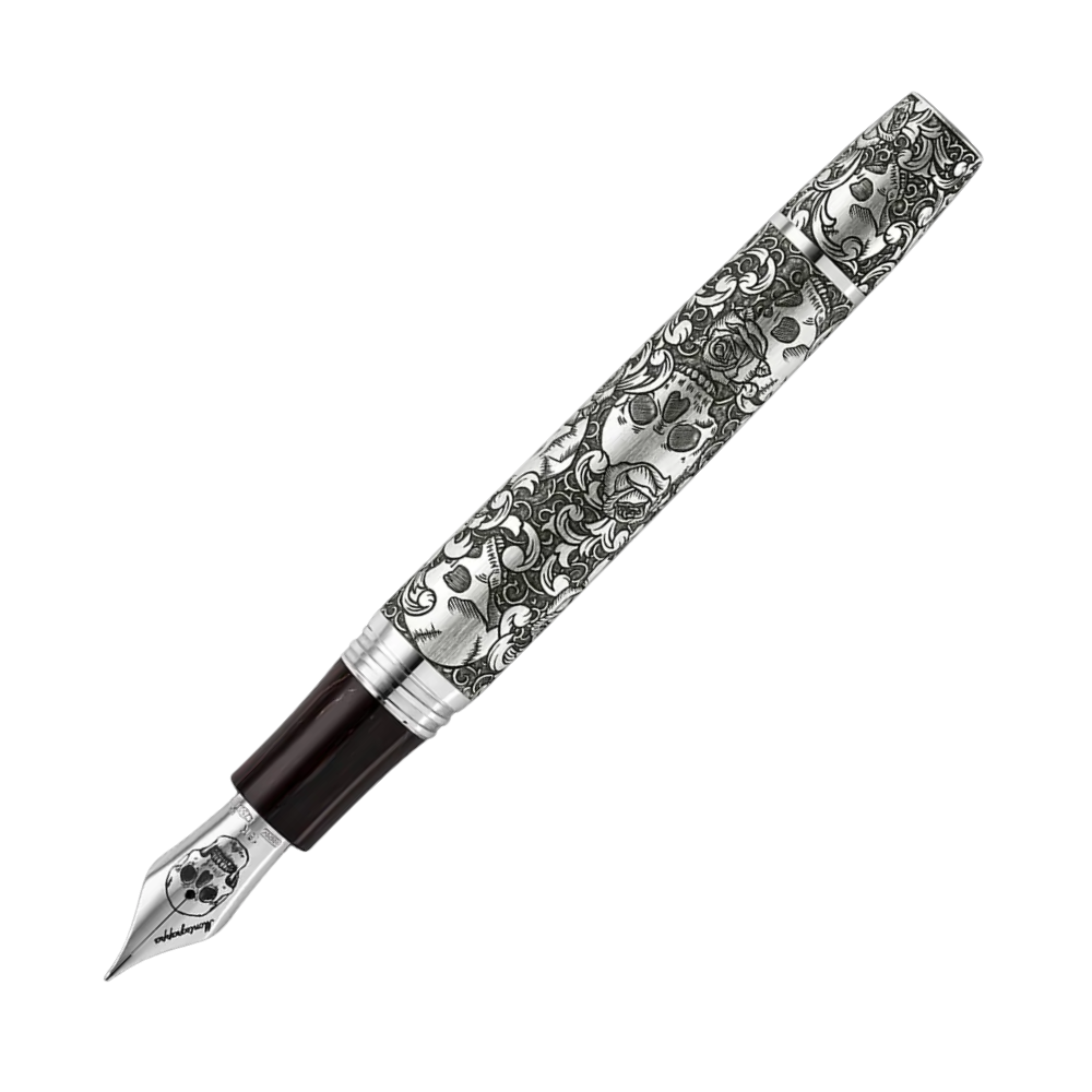 Montegrappa Skulls & Roses Füllfederhalter displayed in premium packaging, with detailed carvings and cubic zirconia accents.