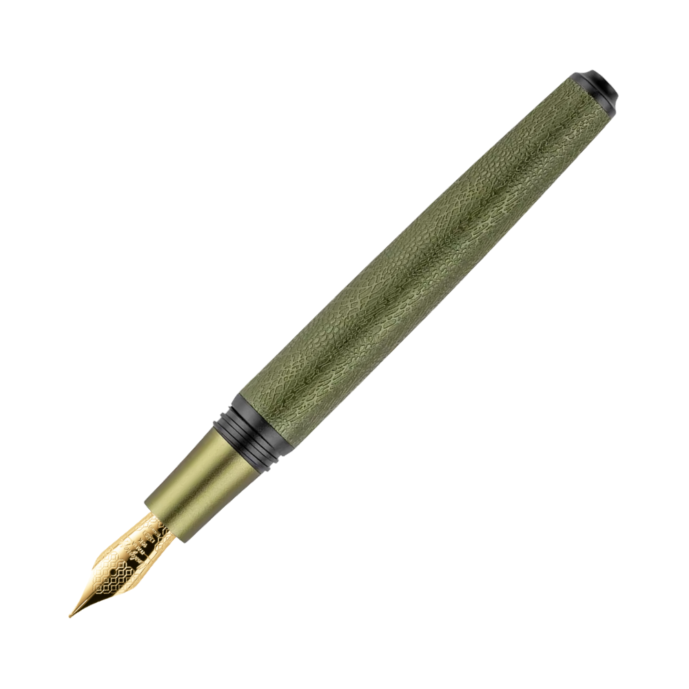 Close-up view of a green fountain pen's nib and clip.