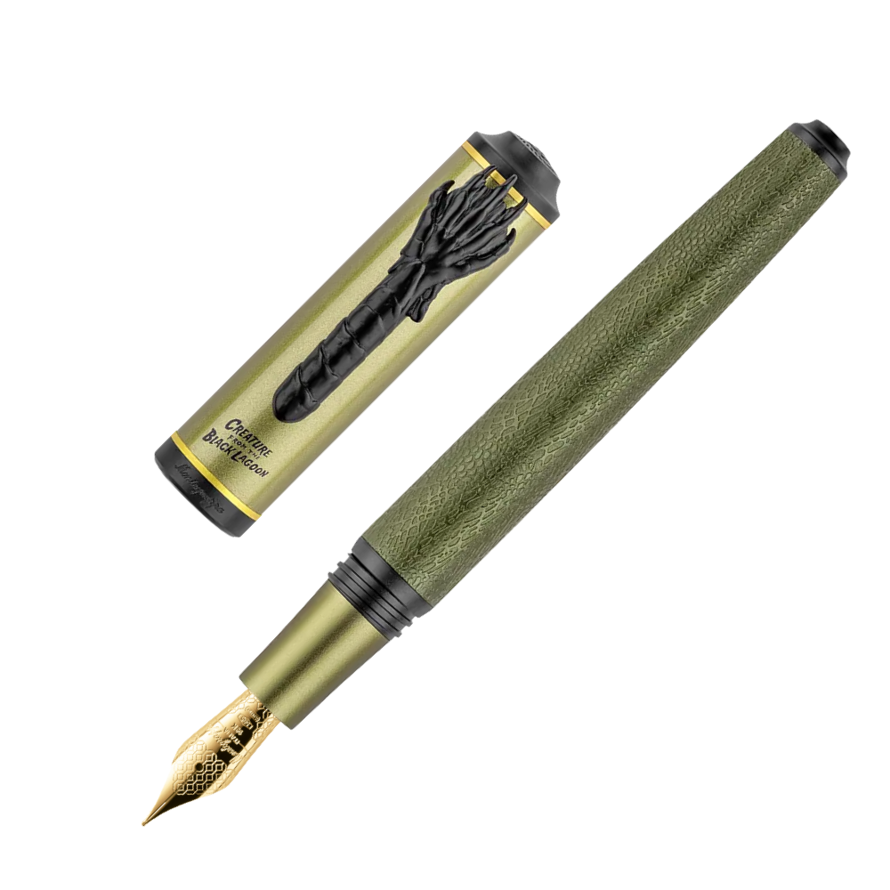 Close-up of a green fountain pen with gold nib, with the cap slightly off.